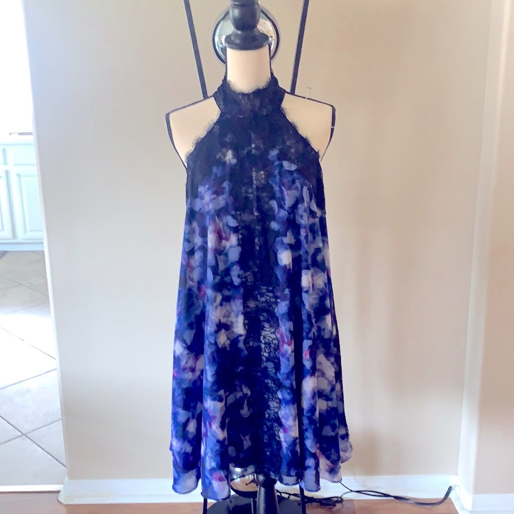 A black lace trimmed Belle Badgley Mischka dress